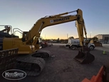 Used Excavator in yard,Back of used Excavator,Side of used Excavator under setting sky,Front of used Excavator